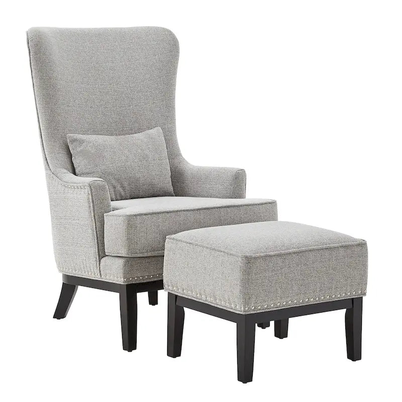 Fauteuil à dossier haut avec repose-pieds