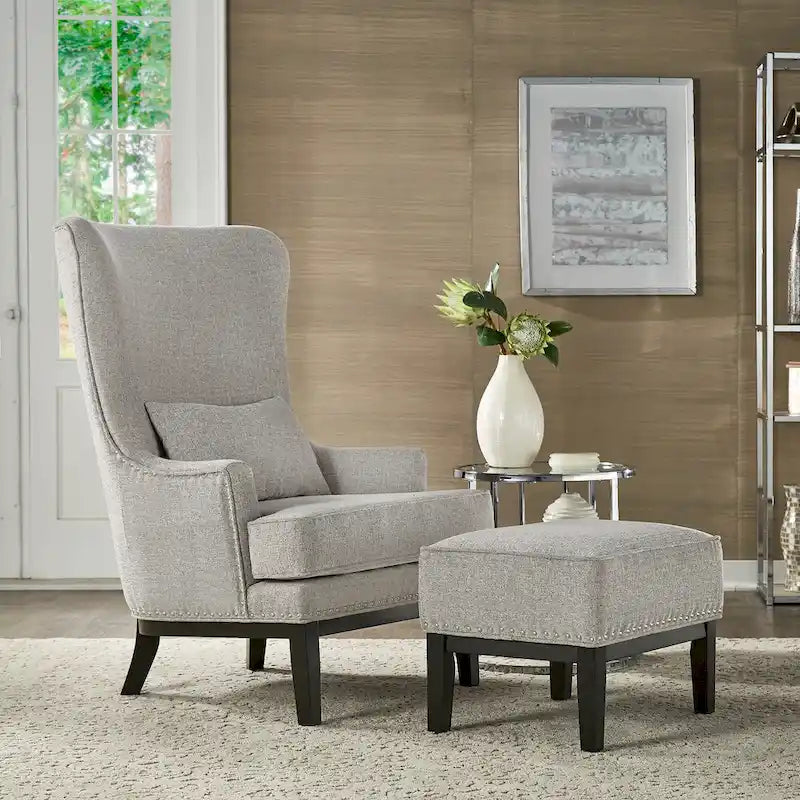 Fauteuil à dossier haut avec repose-pieds