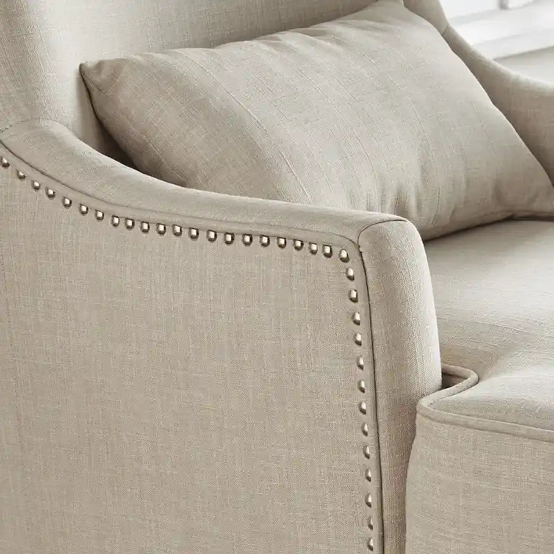 Fauteuil à dossier haut avec repose-pieds