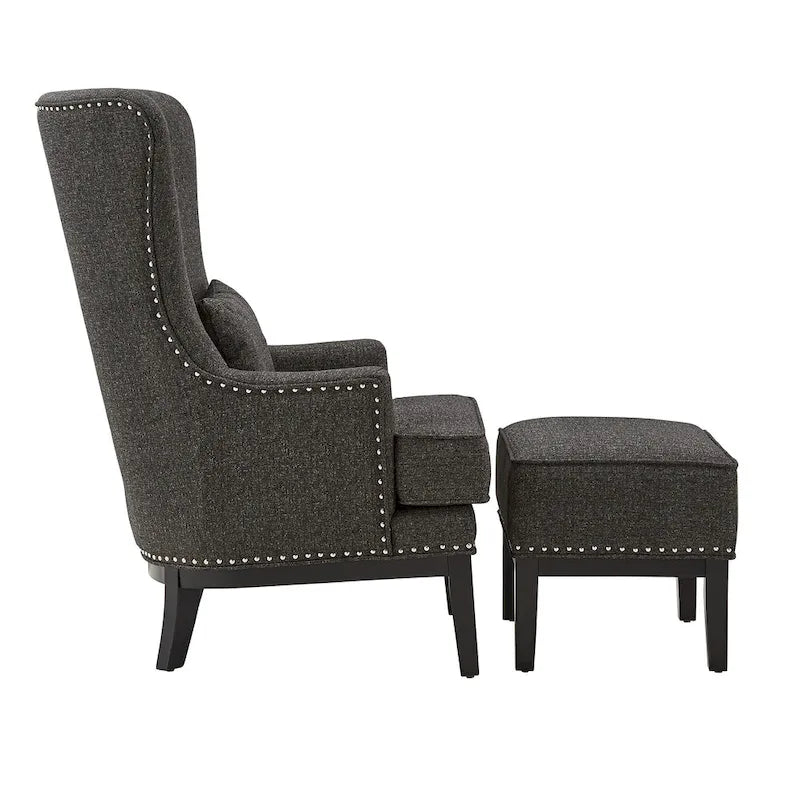 Fauteuil à dossier haut avec repose-pieds