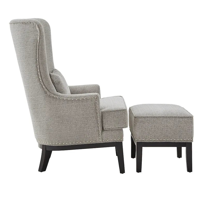 Fauteuil à dossier haut avec repose-pieds