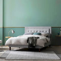 Lit plateforme haut de gamme capitonné beige en tissu gris sable